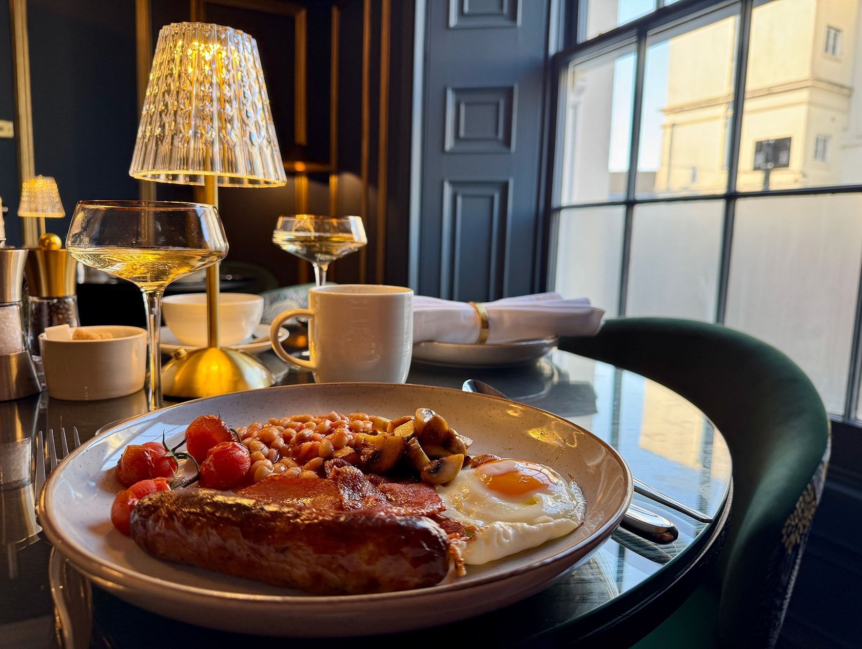 Breakfast by the window in Maison D'Or