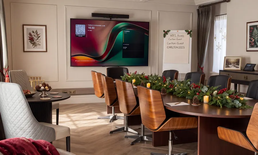 The Atelier boardroom with a garland along the table