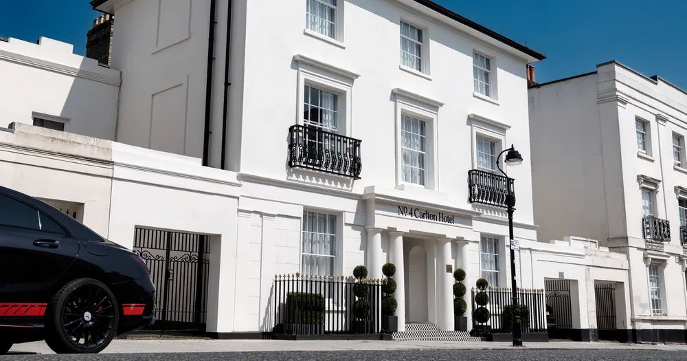 The white Georgian façades of Maison Carlton and No.4 Carlton on Carlton Crescent