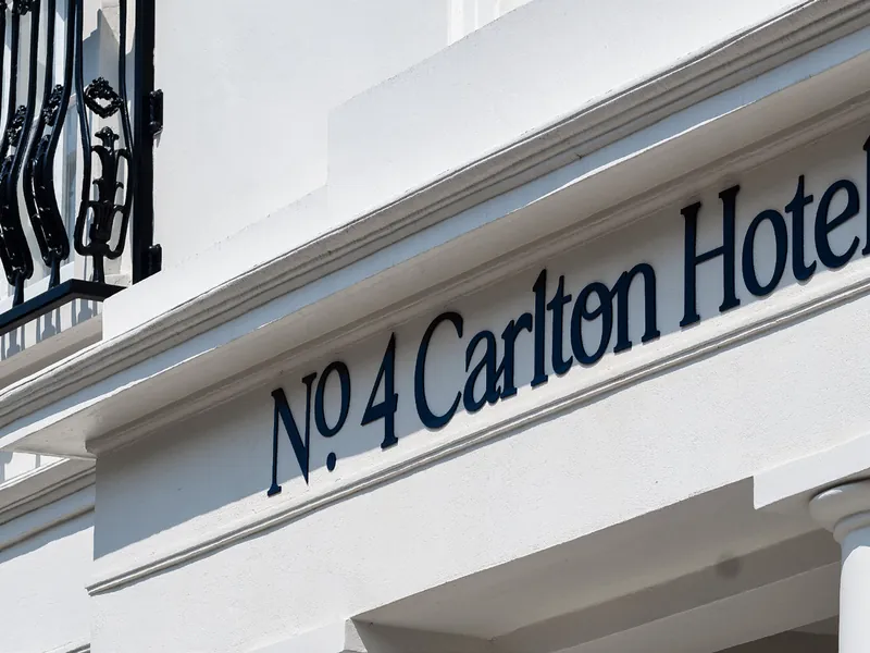 The No.4 Carlton Hotel sign above the portico