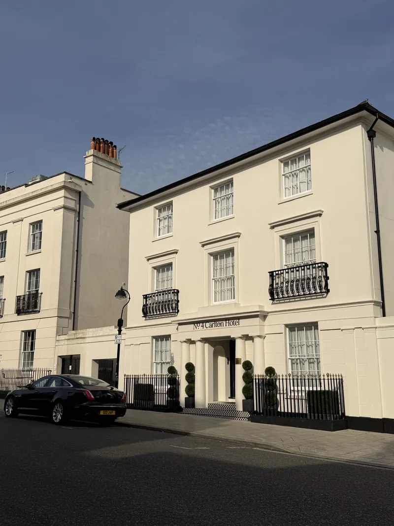 The Georgian façade of the houses on Carlton Crescent in low golden light